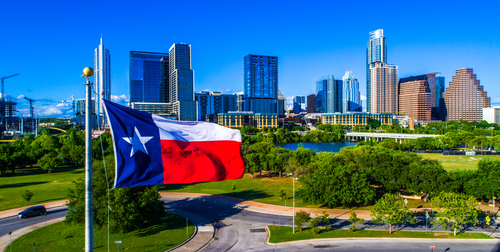 austin texas skyline with flag