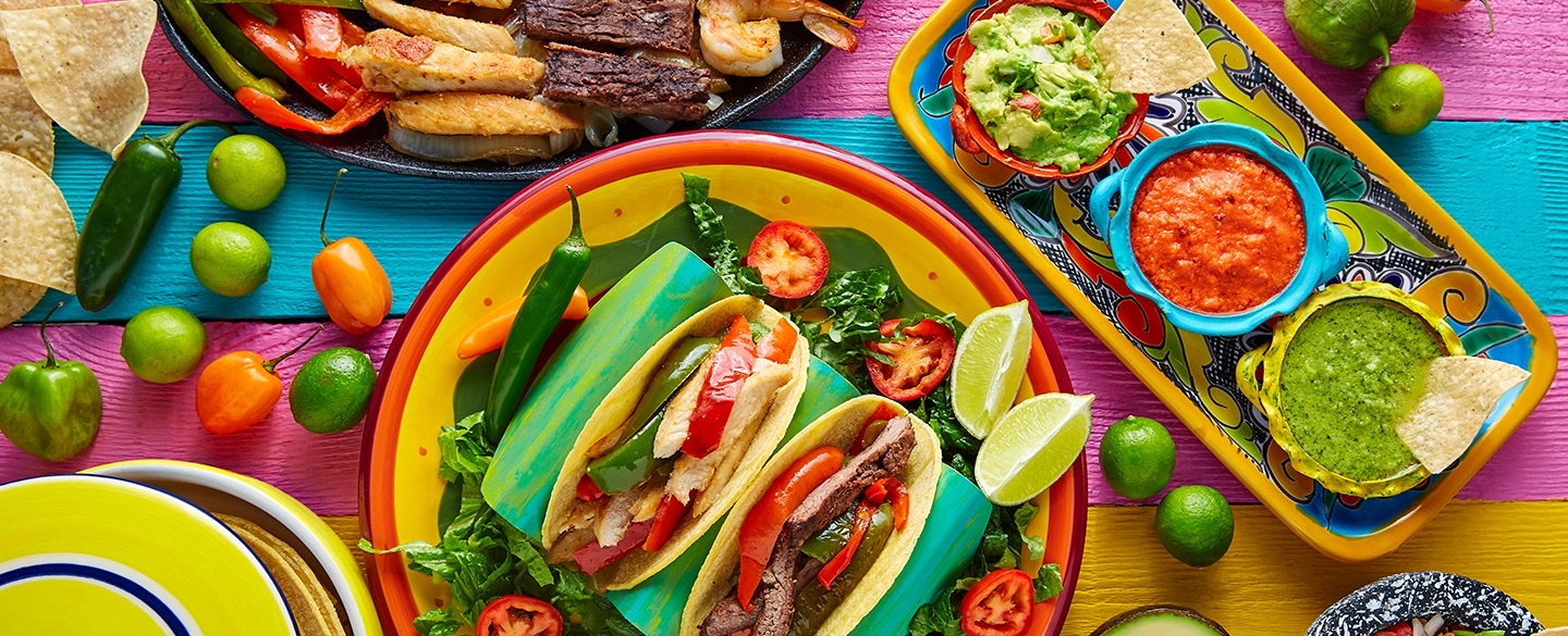 tacos on a colorful tablecloth