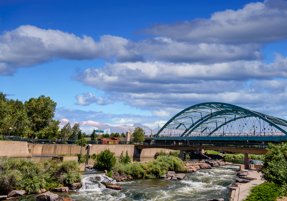 The Platte river running under a bridge in Confluence Park in Denver, Colorado