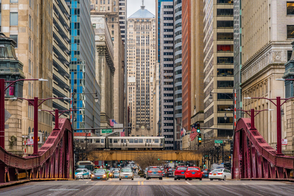 Scene of Chicago street bridge with traffic among modern buildings of Downtown Chicago at Michigan avenue in Chicago, Illinois