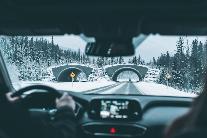 winter driving under bridge