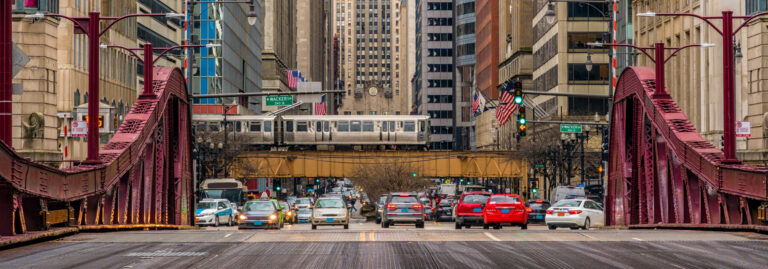 Scene of Chicago street bridge with traffic among modern buildings of Downtown Chicago at Michigan avenue in Chicago, Illinois