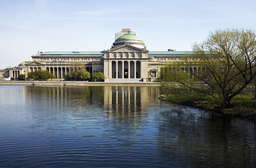 Chicago's Museum of Science and Industry, with reflections in the lake
