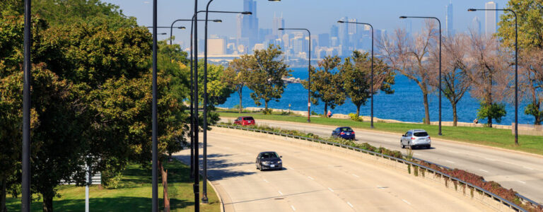 Chicago skyline seen from Lakeshore Drive in the South Side of Chicago, IL, USA.